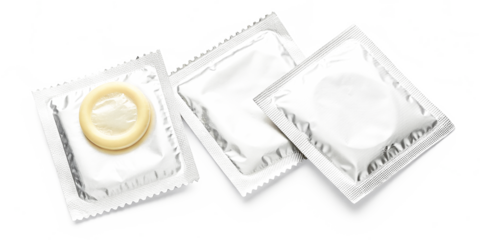 Top-down view of silver condom packs PNG