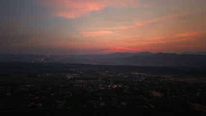 Fototapeta premium sunset over the city Hongsa xaiyabuli Laos