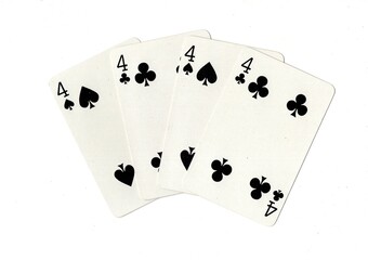A hand of four black playing cards of the same value on a white background.