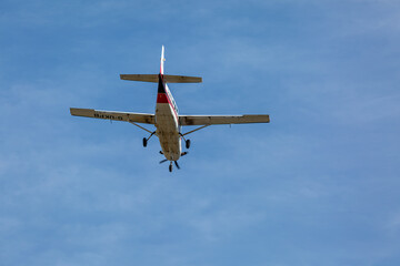 Aircraft in flight, Image shows aircraft G-UKPB a Cessna 208B Grand Caravan flying overhead coming into land
