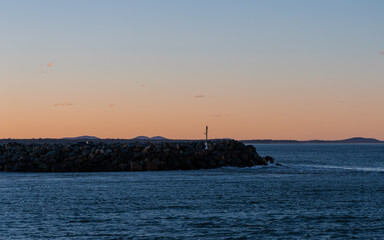 Sunset view at Port Macquarie breakwall, Australia.