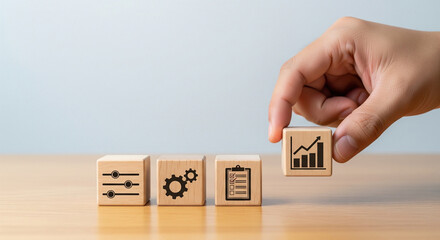 A hand places a growth graph block next to others showing controls, gears, and a checklist. Represents business improvement, optimization, and strategic planning
