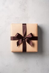 Gift Box with Brown Ribbon: A square, wrapped gift box with a luxurious brown ribbon, presents an air of elegance and anticipation, perfect for celebrations and special occasions.