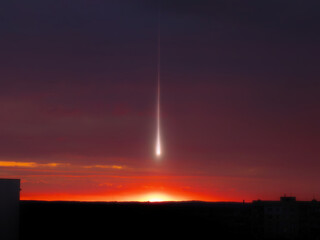 Meteorite in the evening sky after sunset. Bolide above the horizon. Beautiful shooting star...