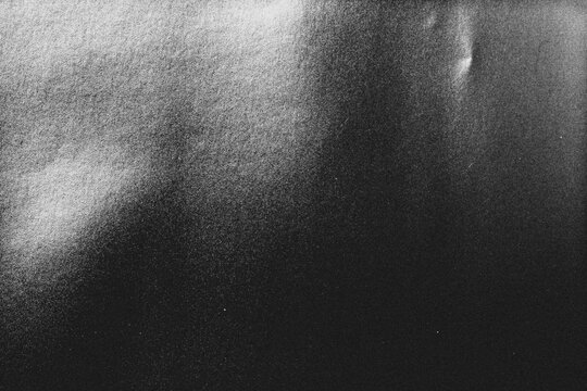 retro film overlay effect with scratch dust and light leaks,retro grain noisy film distressed texture light leak flare on black background,Black and white background