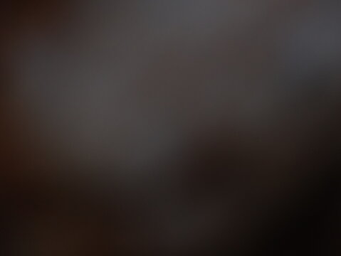 Muted Dark Brown and Grey soft blurry Gradient Background
