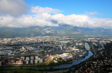 Aerial view at the city Grenoble, the river Isere and the french alps, France