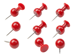A group of seven red push pins arranged on a black background in a studio setting with soft lighting