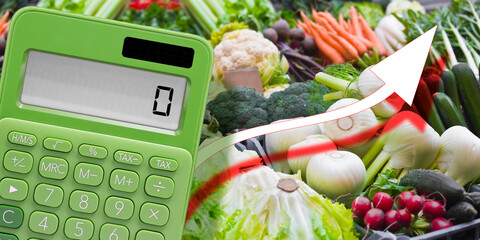 INCREASING COSTS OF FRUIT AND VEGETABLES - Concept with calculator, fresh fruit and vegetables on a...