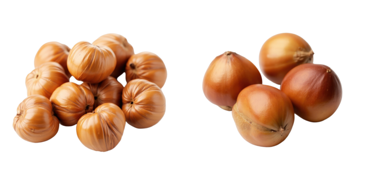Group of unrefined hazelnuts arranged in two clusters on a transparent background showcasing their natural texture and color variation in studio lighting.