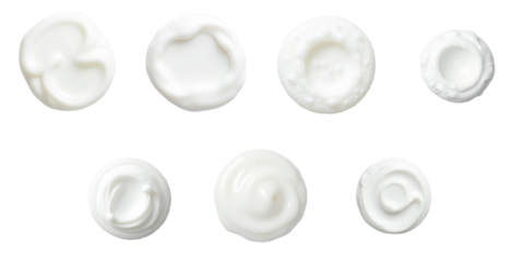 Top view of various cream or foam textures on a transparent background displaying different shapes and patterns, representing shaving cream, bath foam, or cosmetic products, isolated for clarity.