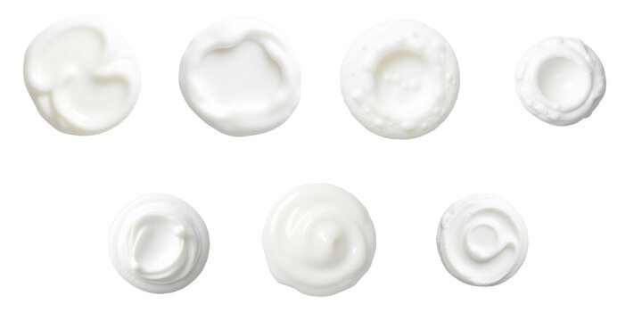 Top view of various cream or foam textures on a transparent background displaying different shapes and patterns, representing shaving cream, bath foam, or cosmetic products, isolated for clarity. - Powered by Adobe