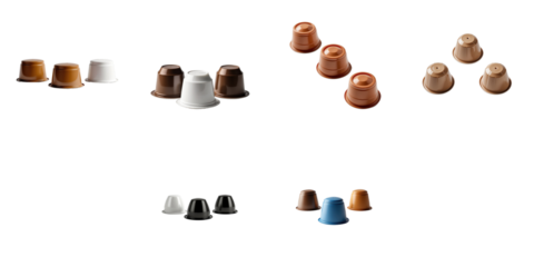 Assortment of plastic coffee capsules in various colors including white, brown, transparent, and blue isolated on a transparent background showcasing different shapes and designs