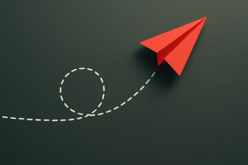 A red paper airplane symbolizes innovation and progress as it follows a dynamic dashed flight path against a dark background