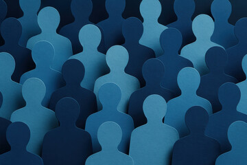A diverse collection paper cutout silhouettes symbolizes and collaboration within a professional environment