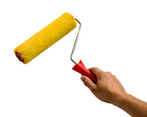 A hand holds a yellow paint roller with a red handle against a transparent background. The roller is clean and ready for painting.