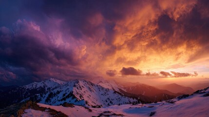 Golden peaks under a vibrant orange and purple sky, showcasing nature's majestic beauty.