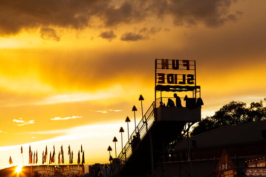 Albuquerque, New Mexico, United States. State Fair, amusement park rides at sunset.