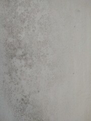 Fototapeta premium A wall with visible dirt and stains,&nbsp;caused by moisture or mold growth
