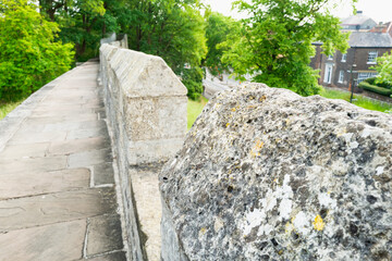 Shallow focus of the famous roman York wall which surrounds the ancient city in England. A public footpath is located on the wall which is at a high point and creates an excellent defensive position.