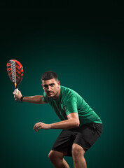Padel player holding racket on green background, perfect for tournament ads, training promotions,...