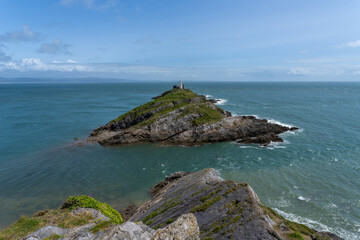 Mumbles lighthouse is located on the outer of two islands of Mumbles head, Mumbles, Swansea, South...