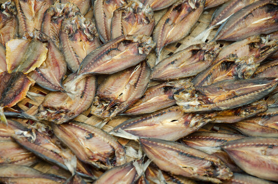 Dried raw fish preserves for sale at vendors seafood shop in Ang Sila jetty local market