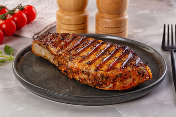 Grilled pork steak with bone
