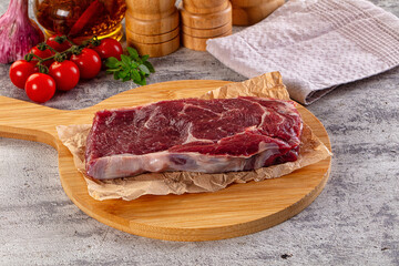 Gourmet raw rib eye steak