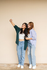 happy young couple taking selfie with mobile phone