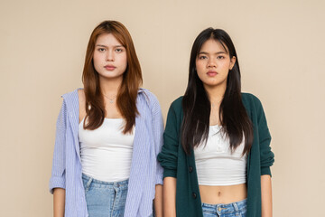 two teenage girls looking at camera