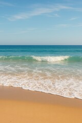 Fototapeta premium Tranquil beach with golden sand and clear waves under blue sky. AI-generated.