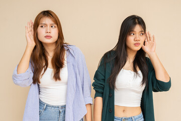 two young women listening