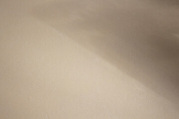 Template concept with leather texture effect in beige color and diffused light in the form of...