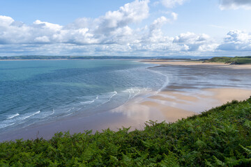 Tide retreating from Whiteford Beach near the northern tip of the Gower Peninsula in South Wales.