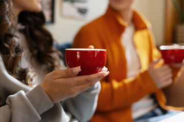 Women enjoying a hot beverage during a meeting