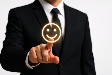 Businessman in suit points to glowing smiley face emoji icon, indicating positive communication.