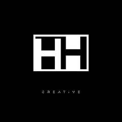 Obraz premium HH Negative Space Logo – Minimalist Black & White Monogram for Creative Branding, Fashion, Identity & Modern Logo Design 