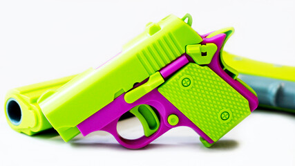 Two bright children's pistols on a white background
