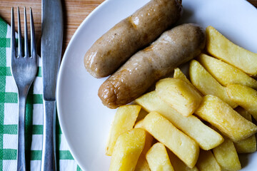 Two Pork Sausages With Chips Meal