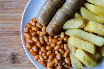 British Favourite Pork Sausages With Chips And Baked Beans In Tomato Sauce