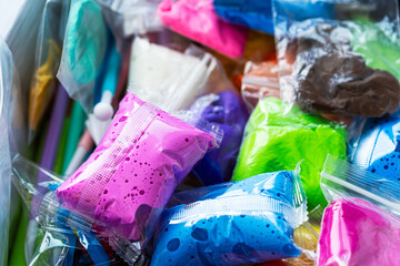 Bright packages of colorful air dry clay for children’s creativity and learning. Perfect for...