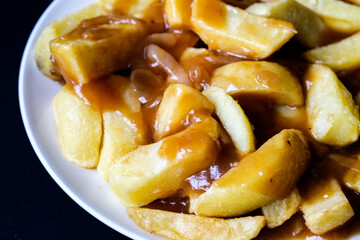 Plate of Wholesome Chips With Onion Gravy