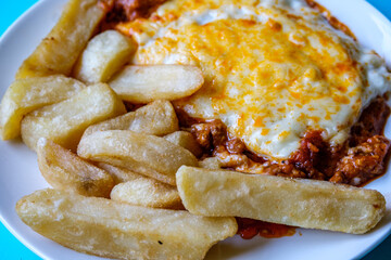 Classic  Meal Of Italian Style Beef Lasagna With Chips