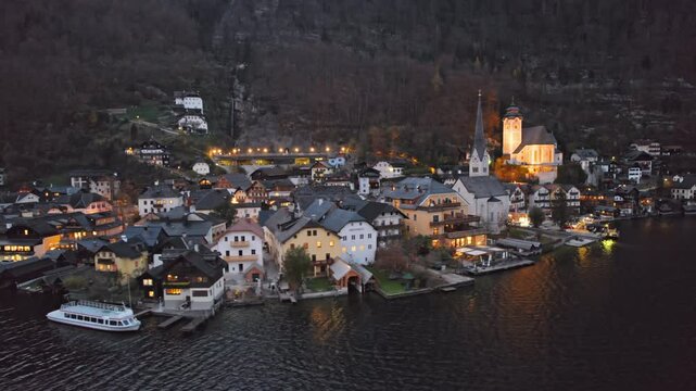 Night flight over of Hallstatt village in Salzkammergut, Upper Austria.
