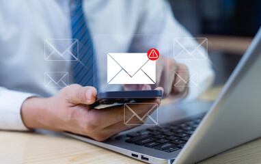 Businessman using smartphone to check new email notification, inbox received electronic message...