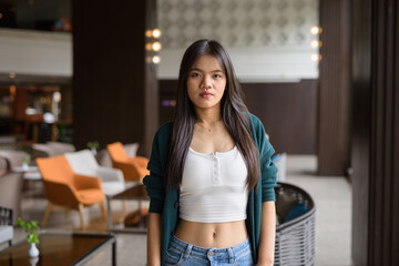 portrait of a young woman in a restaurant