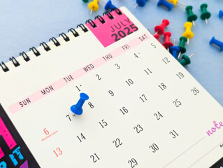 7th July 2025 marked on calendar with push pin