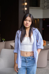 Young beautiful woman looking at camera