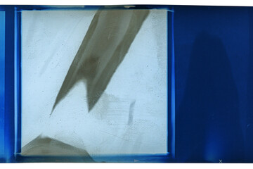 Grungy color 120mm negative film isolated on white background. Medium format film material on white...